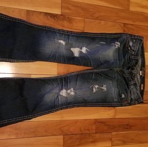 Silver Jean's distressed boot cut jean 30w x 33l